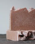 Two sunset spice soaps sit on top of one another.