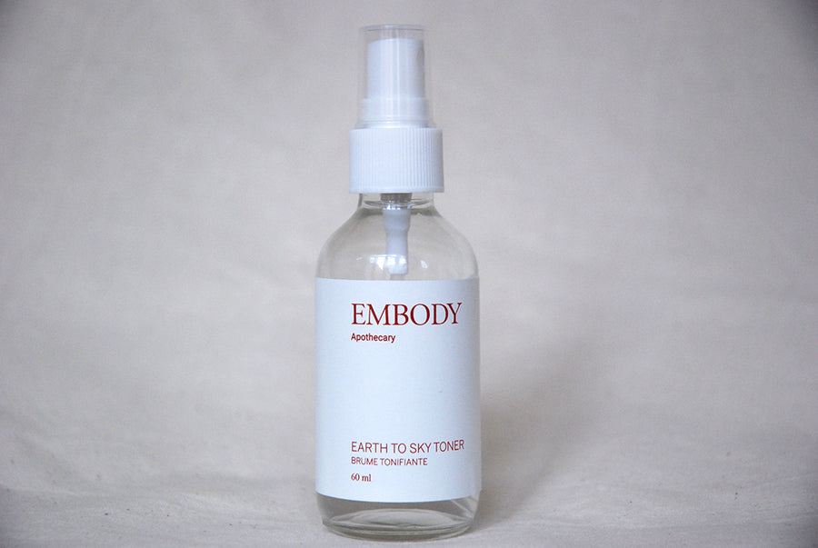 The all-natural, organic Earth to Sky facial toner, made with sweetfern, mallow, and calendula  hydrosols sits in front of a beige backdrop.